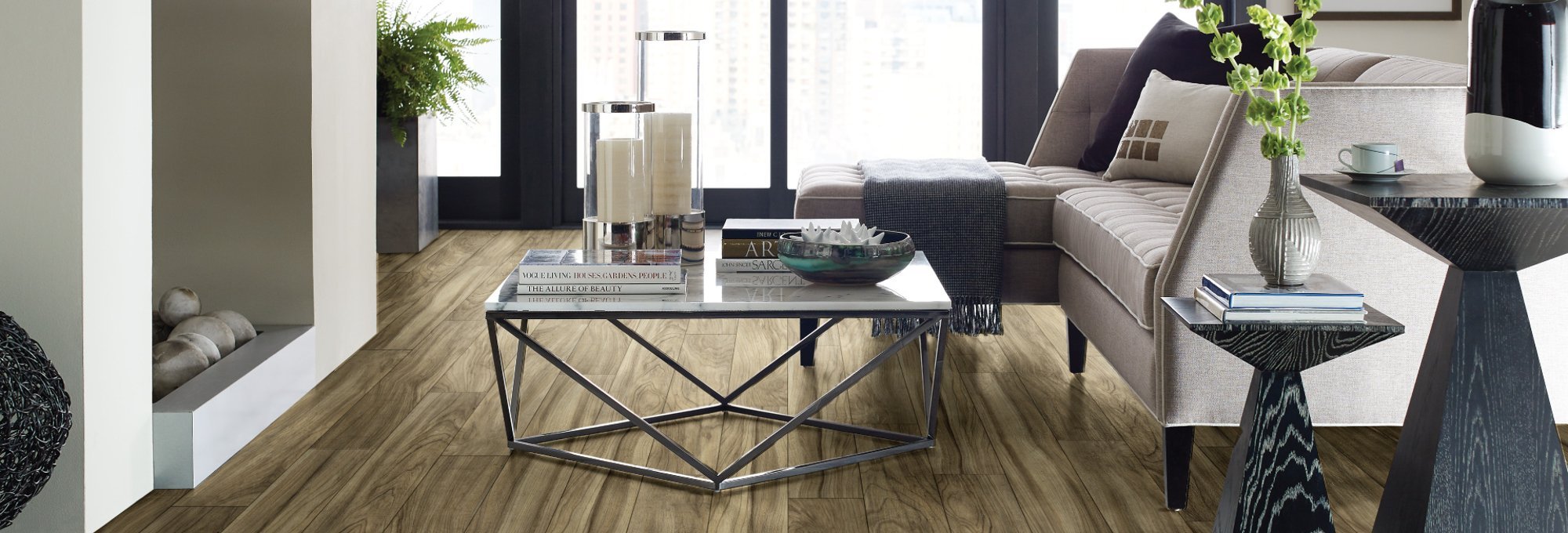 Living room with luxury vinyl flooring from The Flooring Store in the Brighton, MI area